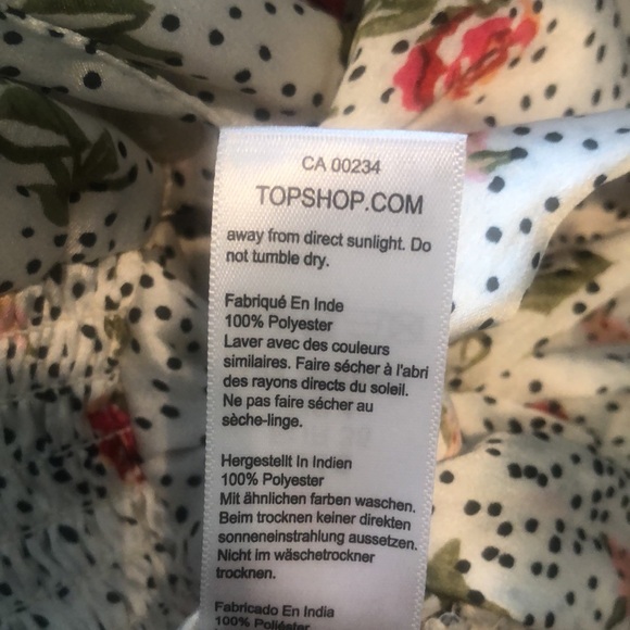 Topshop blouse from Nordstrom. US 4. Floral button front with tie bottom detail. - Picture 5 of 7
